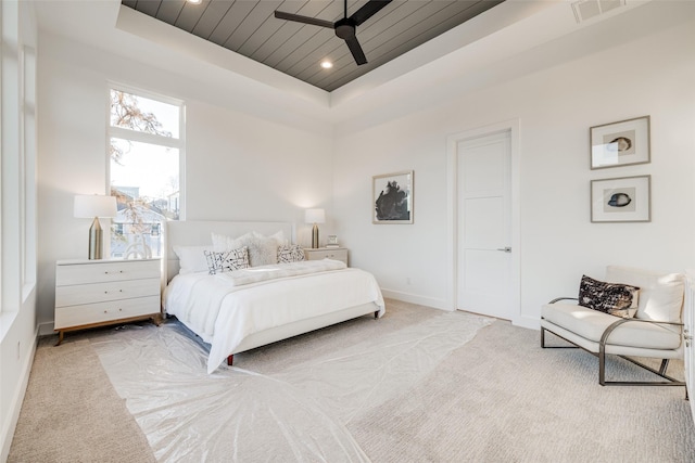 2015 Hopkins St, Houston, TX 77006 - carpeted bedroom with a tray ceiling, baseboards, wooden ceiling, recessed lighting, and ceiling fan