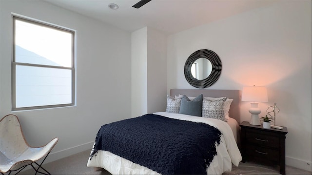 2015 Hopkins St, Houston, TX 77006 - bedroom with baseboards, multiple windows, and carpet floors