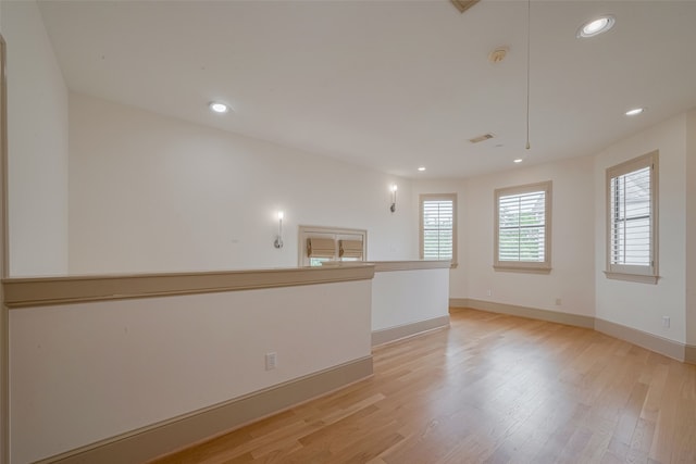 2034 Colquitt St Unit A, Houston, TX 77098 - unfurnished room with light wood-style flooring, baseboards, recessed lighting, and a smoke detector
