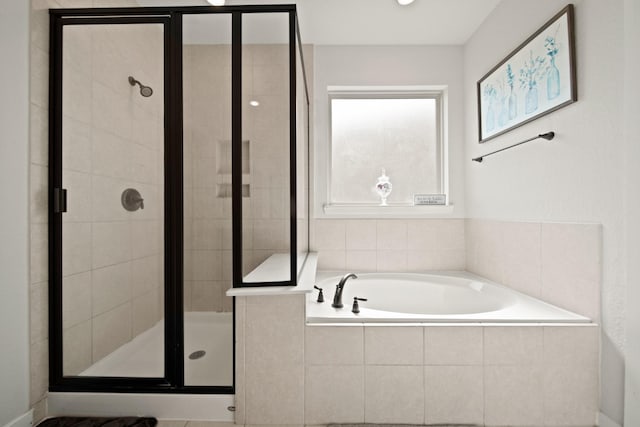 358 Cavil Barrier Ln, La Porte, TX 77571 - full bath featuring a bath and a shower stall