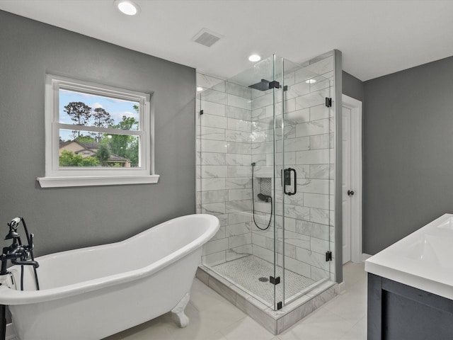 3422 N Elm Rd, Santa Fe, TX 77517 - bathroom featuring a soaking tub, a stall shower, vanity, and recessed lighting