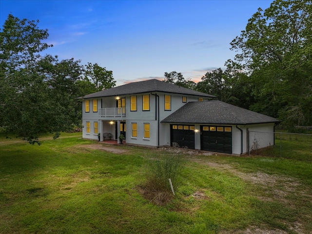 3422 N Elm Rd, Santa Fe, TX 77517 - view of front of home featuring a balcony, dirt driveway, a garage, and roof with shingles