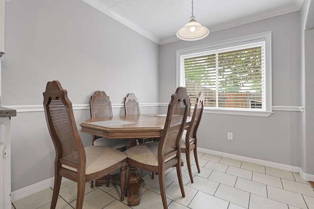 7162 Crownwest St Unit 7162, Houston, TX 77072 - dining area with ornamental molding, baseboards, and light tile patterned floors