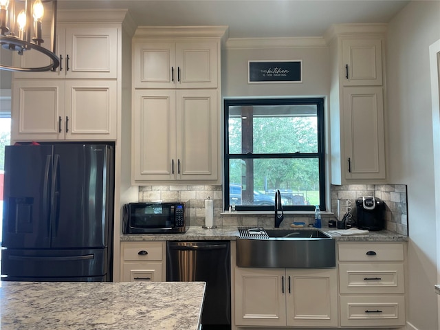3295 Fm 524, Sweeny, TX 77480 - kitchen with black appliances, a sink, tasteful backsplash, white cabinets, and a chandelier