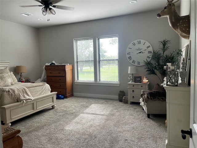3295 Fm 524, Sweeny, TX 77480 - carpeted bedroom featuring baseboards and a ceiling fan