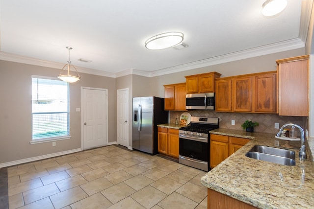 1802 Dominic Ln, Houston, TX 77049 - kitchen with stainless steel appliances, a sink, brown cabinets, backsplash, and ornamental molding