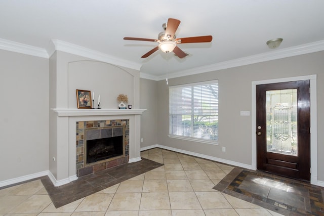 1802 Dominic Ln, Houston, TX 77049 - tiled foyer entrance with crown molding, a fireplace, ceiling fan, and baseboards