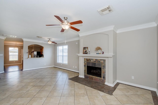 1802 Dominic Ln, Houston, TX 77049 - unfurnished living room with crown molding, tile patterned floors, healthy amount of natural light, and ceiling fan
