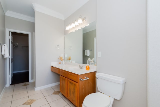 1802 Dominic Ln, Houston, TX 77049 - bathroom with vanity, toilet, ornamental molding, tile patterned floors, and a spacious closet