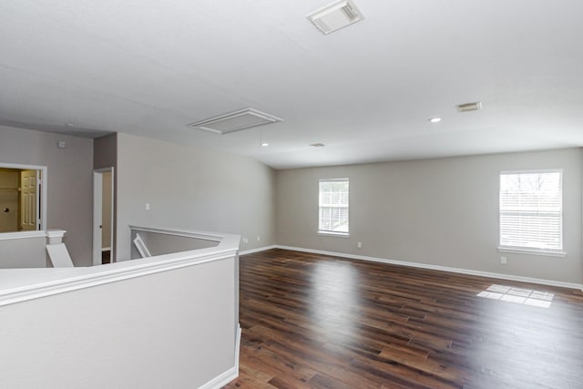 1802 Dominic Ln, Houston, TX 77049 - unfurnished room featuring attic access, dark wood-style floors, baseboards, and recessed lighting