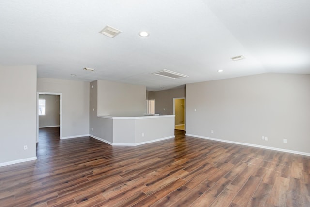 1802 Dominic Ln, Houston, TX 77049 - empty room with dark wood finished floors, recessed lighting, baseboards, and lofted ceiling