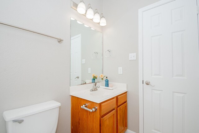 1802 Dominic Ln, Houston, TX 77049 - bathroom featuring vanity and toilet