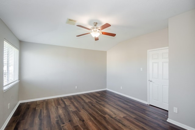 1802 Dominic Ln, Houston, TX 77049 - unfurnished room with a ceiling fan, dark wood finished floors, baseboards, and vaulted ceiling