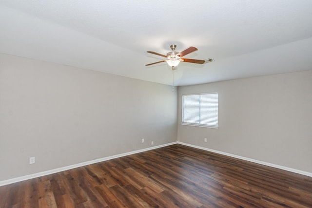 1802 Dominic Ln, Houston, TX 77049 - spare room featuring a ceiling fan, baseboards, and dark wood-style floors