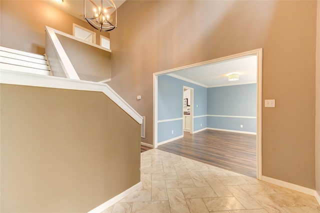 1322 Village Garden Dr, Missouri City, TX 77459 - foyer featuring a chandelier, stairs, and crown molding