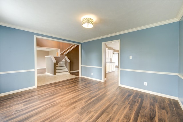 1322 Village Garden Dr, Missouri City, TX 77459 - empty room with stairway, ornamental molding, and wood finished floors