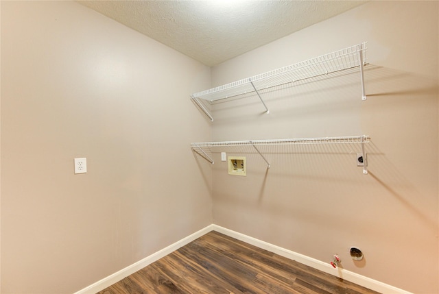 1322 Village Garden Dr, Missouri City, TX 77459 - washroom featuring hookup for a gas dryer, hookup for a washing machine, and dark wood-type flooring