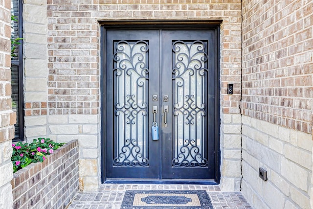 8215 Frontenac Dr, Houston, TX 77071 - doorway to property featuring brick siding