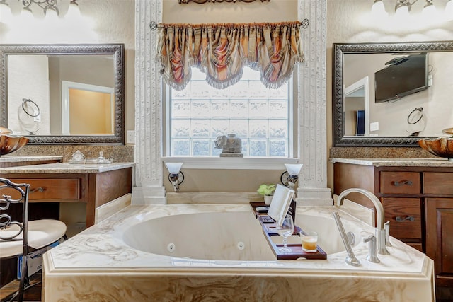 8215 Frontenac Dr, Houston, TX 77071 - bathroom featuring a tub with jets and vanity