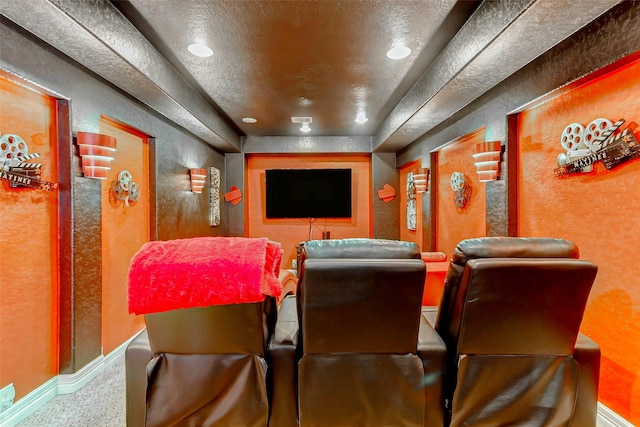 8215 Frontenac Dr, Houston, TX 77071 - home theater featuring a textured wall, carpet flooring, recessed lighting, and baseboards
