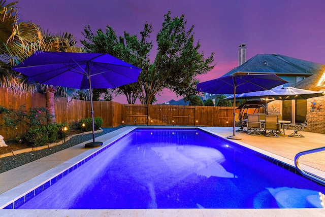 28515 Blue Holly Ln, Katy, TX 77494 - view of swimming pool featuring a fenced backyard, outdoor dining space, and a patio
