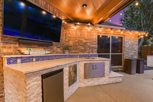 28515 Blue Holly Ln, Katy, TX 77494 - view of patio / terrace with exterior kitchen and a sink