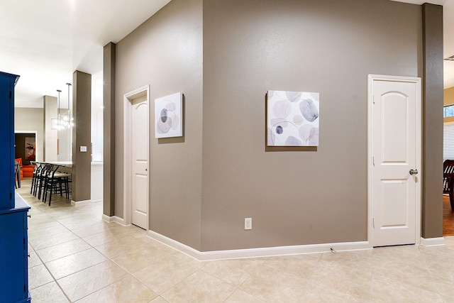 28515 Blue Holly Ln, Katy, TX 77494 - corridor featuring light tile patterned floors and baseboards