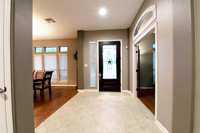 28515 Blue Holly Ln, Katy, TX 77494 - foyer entrance featuring baseboards and light tile patterned flooring