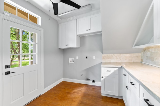 2042 Darby Ln, Fresno, TX 77545 - laundry room featuring hookup for an electric dryer, gas dryer hookup, ceiling fan, washer hookup, and cabinet space