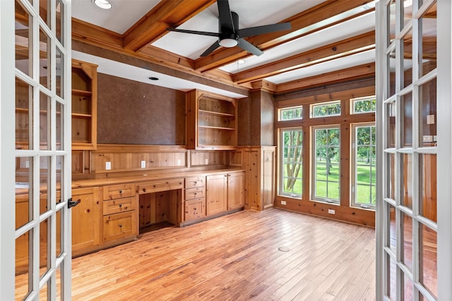 2042 Darby Ln, Fresno, TX 77545 - unfurnished office with french doors, beamed ceiling, built in study area, a ceiling fan, and light wood finished floors