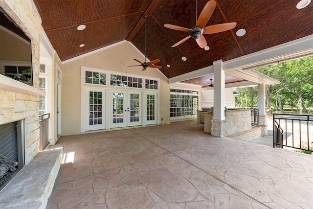 2042 Darby Ln, Fresno, TX 77545 - view of patio with ceiling fan, french doors, area for grilling, and an outdoor stone fireplace