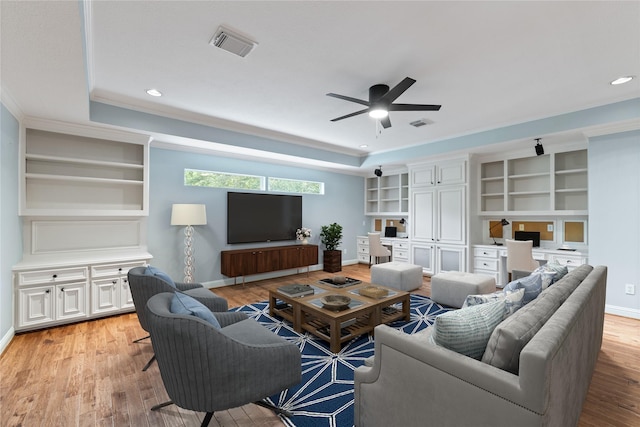 2042 Darby Ln, Fresno, TX 77545 - living room with a tray ceiling, baseboards, light wood-type flooring, ceiling fan, and recessed lighting
