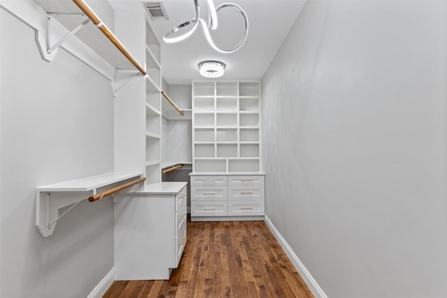 2042 Darby Ln, Fresno, TX 77545 - walk in closet with dark wood finished floors