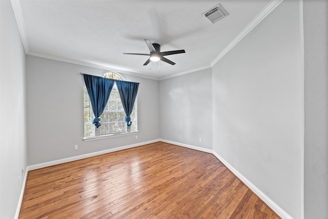 2042 Darby Ln, Fresno, TX 77545 - empty room with ceiling fan, wood finished floors, baseboards, and ornamental molding