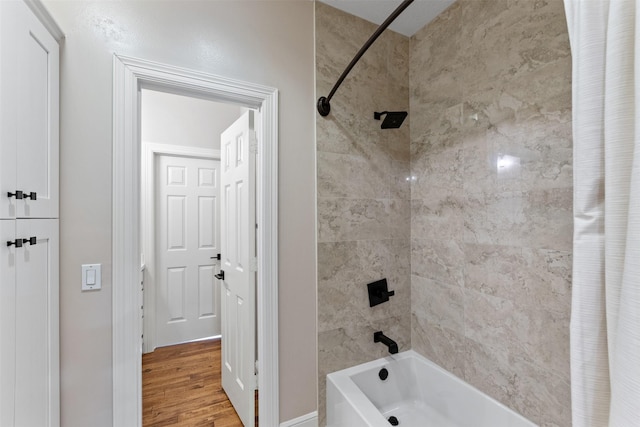2042 Darby Ln, Fresno, TX 77545 - full bath featuring shower / bathtub combination with curtain and wood finished floors