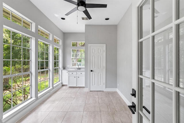 2042 Darby Ln, Fresno, TX 77545 - unfurnished sunroom featuring plenty of natural light, a sink, and french doors