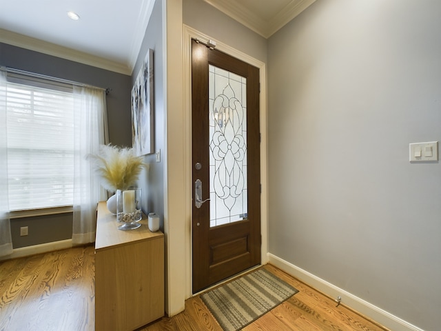 6319 Riverview Way, Houston, TX 77057 - foyer with ornamental molding, baseboards, light wood-style floors, and healthy amount of natural light