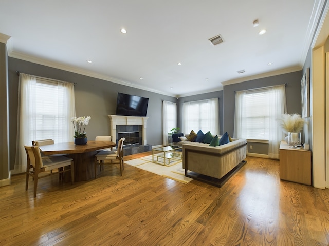 6319 Riverview Way, Houston, TX 77057 - living area with a fireplace, wood finished floors, ornamental molding, baseboards, and recessed lighting