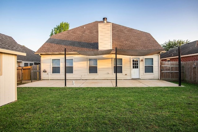 30615 S Sulphur Creek Dr, Magnolia, TX 77355 - back of house featuring a patio area, roof with shingles, and a chimney