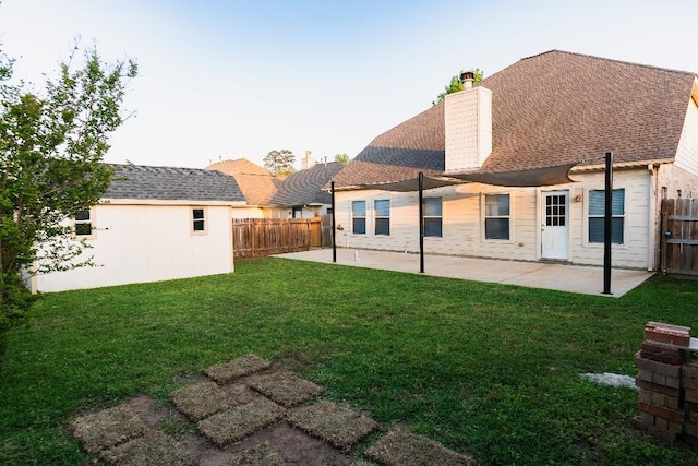 30615 S Sulphur Creek Dr, Magnolia, TX 77355 - rear view of house with a patio and a chimney