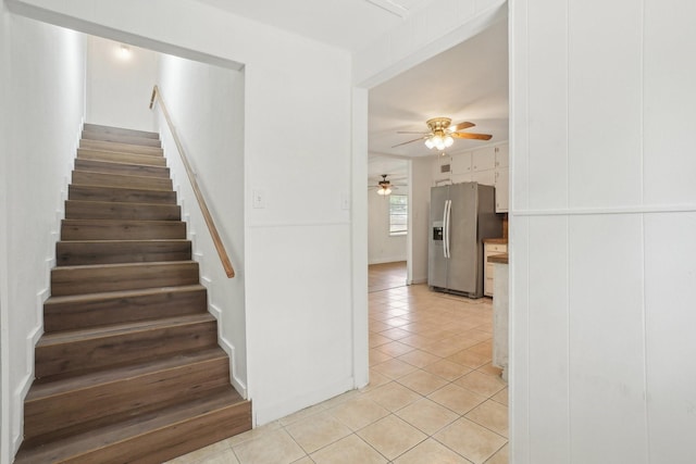 2112 Leyte Dr, Tool, TX 75143 - stairway featuring tile patterned flooring and ceiling fan