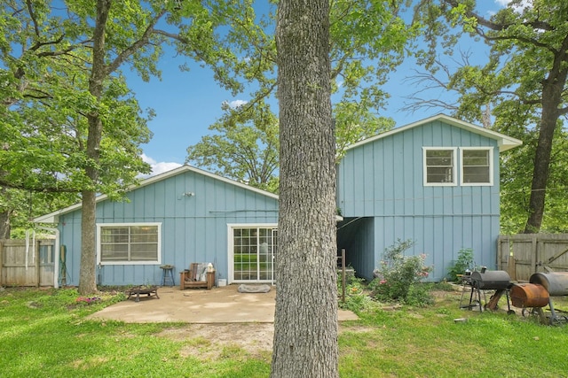 2112 Leyte Dr, Tool, TX 75143 - back of house with a patio area and board and batten siding