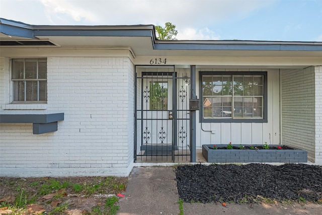 6134 Guadalupe St, Houston, TX 77016 - entrance to property with brick siding and board and batten siding