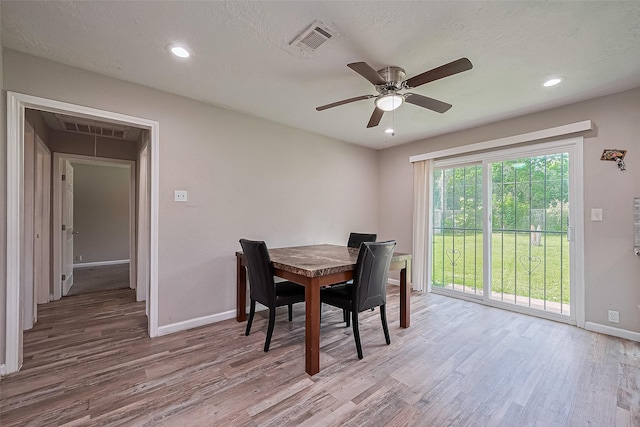 6134 Guadalupe St, Houston, TX 77016 - dining space featuring wood finished floors, baseboards, a ceiling fan, and recessed lighting