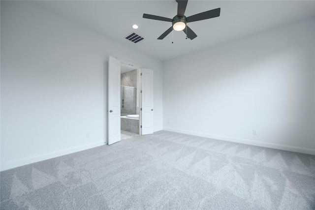 825 Laguna Green Ln, Katy, TX 77493 - spare room featuring light colored carpet, baseboards, ceiling fan, and recessed lighting
