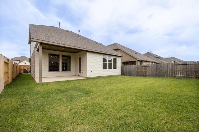 825 Laguna Green Ln, Katy, TX 77493 - rear view of house featuring a patio and roof with shingles