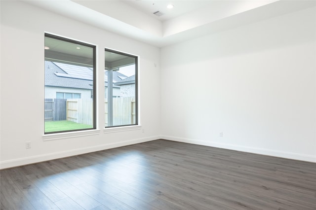 825 Laguna Green Ln, Katy, TX 77493 - spare room featuring dark wood finished floors and baseboards