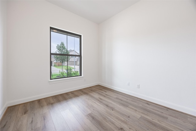 825 Laguna Green Ln, Katy, TX 77493 - unfurnished room featuring light wood-style flooring and baseboards