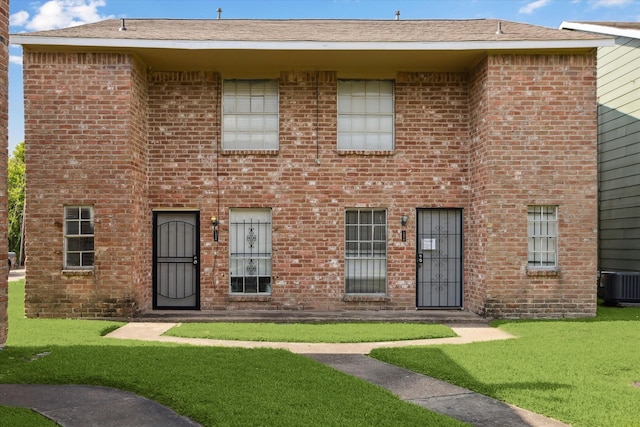 12318-12320 Ormandy St, Houston, TX 77085 - multi unit property with central air condition unit, a front lawn, and brick siding