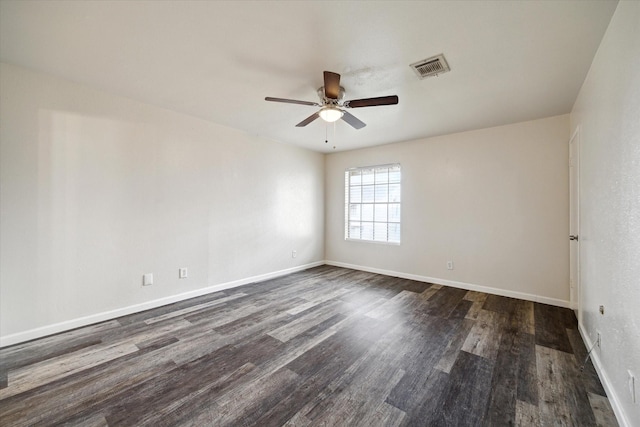12318-12320 Ormandy St, Houston, TX 77085 - unfurnished room with ceiling fan, dark wood finished floors, and baseboards